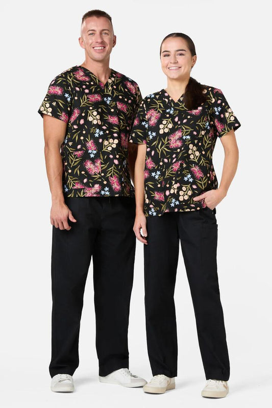 Image of a model wearing Pants. Productname: Bottlebrush Top & Pant Scrub Set in Black colour by brand - Scrubs With Love