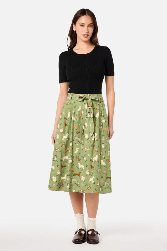 Image of a model wearing Skirts. Productname: Cute Dogs Midi Skirt in Green colour by brand - Princess Highway