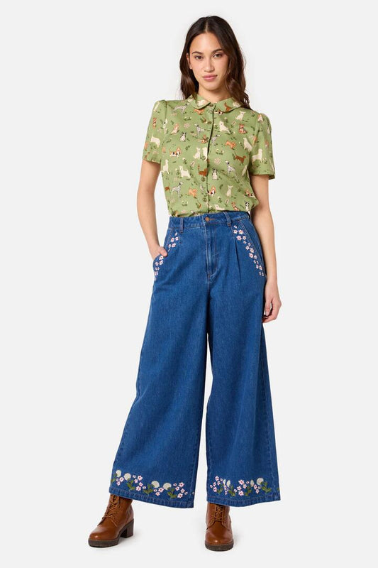 Image of a model wearing Tops. Productname: Cute Dogs Blouse in Green colour by brand - Princess Highway