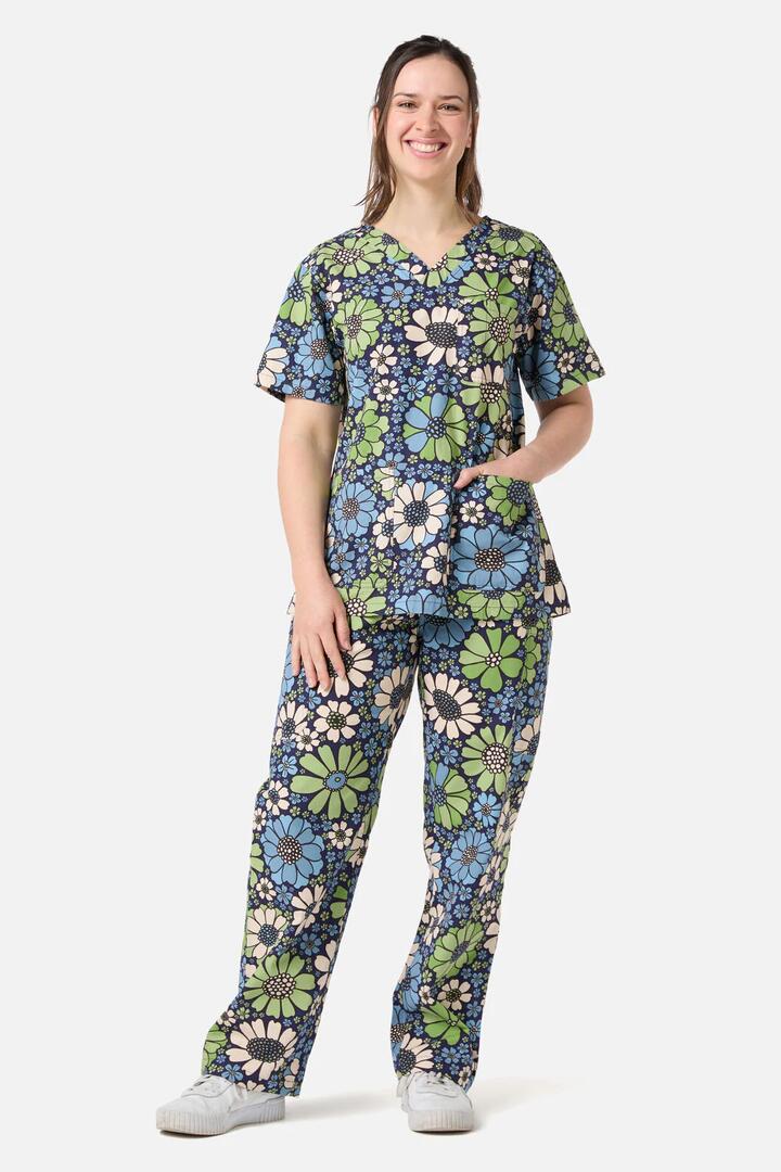 Image of a model wearing Uniforms & Workwear. Productname: Marigold Scrub Set in Blue colour by brand - Scrubs With Love