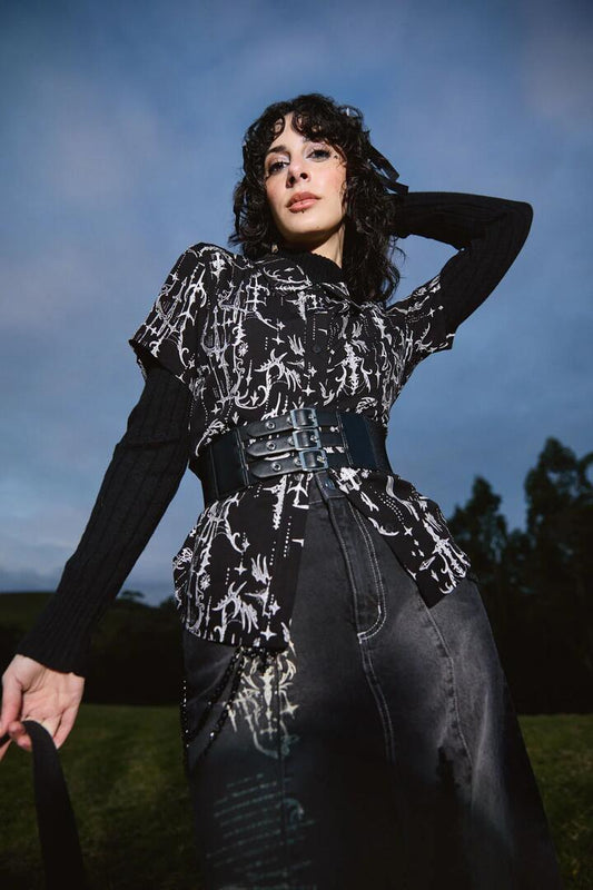 Image of a model wearing Tops. Productname: Cyber Print Viscose Blouse in Black colour by brand - Black Friday