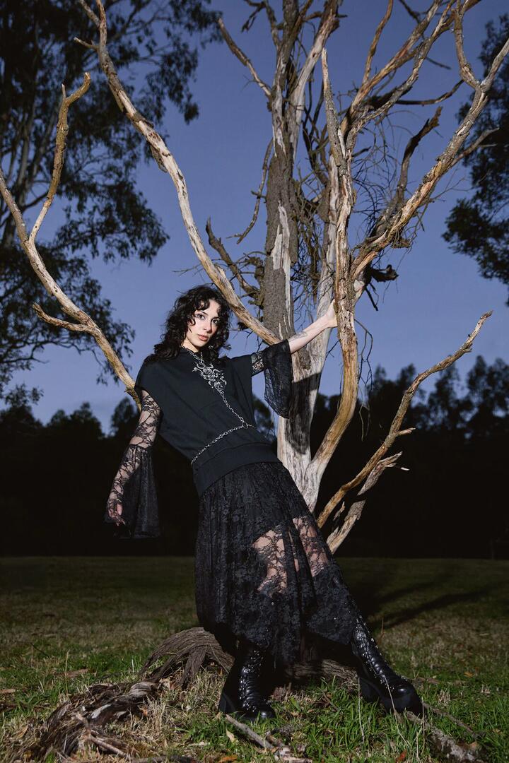 Image of a model wearing Dress. Productname: Keeper Of The Woods Lace Dress in Black colour by brand - Black Friday