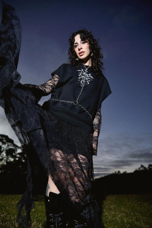 Image of a model wearing Outerwear. Productname: Tech Sleeveless Hoodie in Black colour by brand - Black Friday
