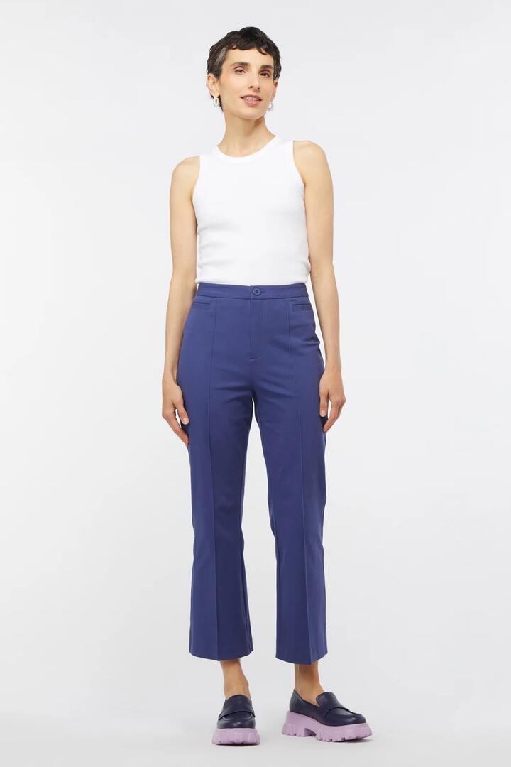 Image of a model wearing Pants. Product name - Celeste Pant in Navy colour by brand - Gorman