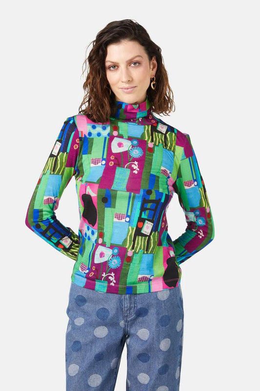 Image of a model wearing Tops. Productname: Collage Notes Merino Polo in Print colour by brand - Gorman