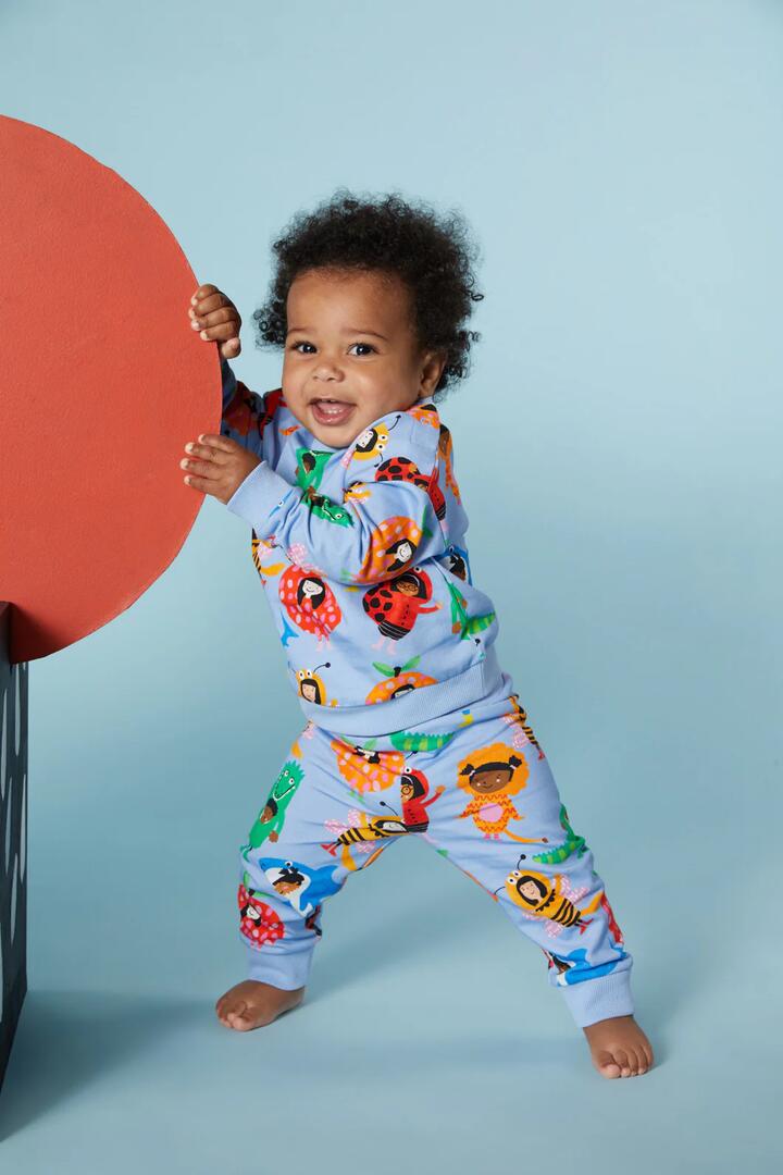 Image of a model wearing Pants. Productname: Dress Ups Baby Jogger in Blue colour by brand - Gorman