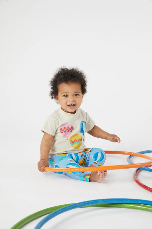 Image of a model wearing Tops. Productname: Fly Away Baby SS Tee in Cream colour by brand - Gorman