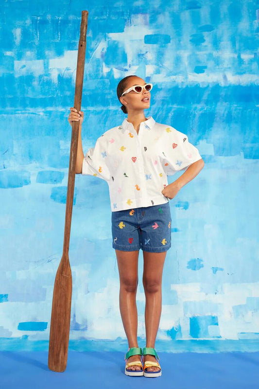 Image of a model wearing Shorts. Productname: Birds And Flowers Embroidered Short in Blue colour by brand - Gorman