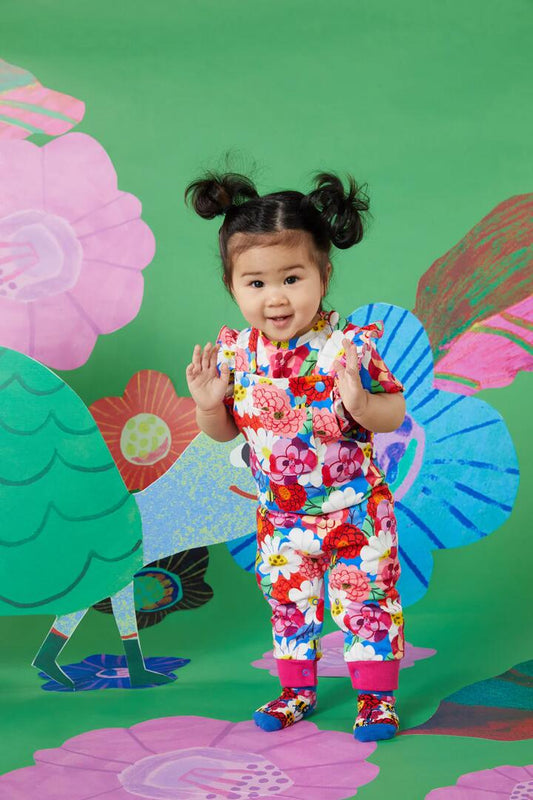 Image of a model wearing Pants. Productname: Dahlia Baby Overalls in Print colour by brand - Gorman