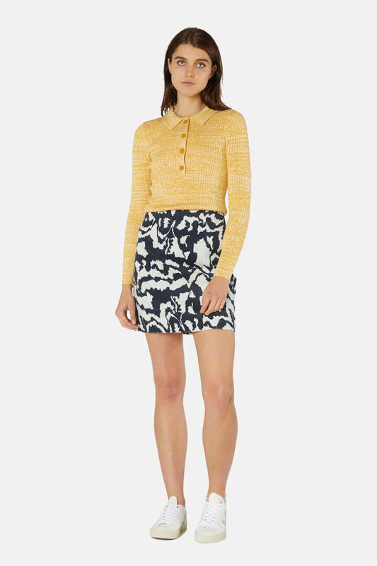 Image of a model wearing Skirts. Product name - Texta MNT Corduroy Mini Dress in Print colour by brand - Gorman