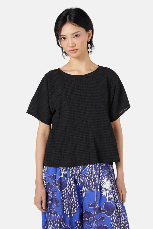 Image of a model wearing Tops. Productname: Gridlock Top in Black colour by brand - Gorman