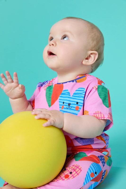 Image of a model wearing Tops. Productname: Hearts Baby SS Tee in Pink colour by brand - Gorman