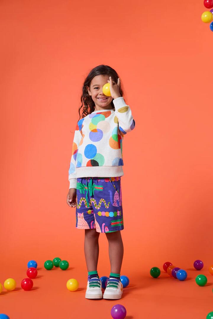 Image of a model wearing Outerwear. Productname: Confetti Kids Sweater in Print colour by brand - Gorman