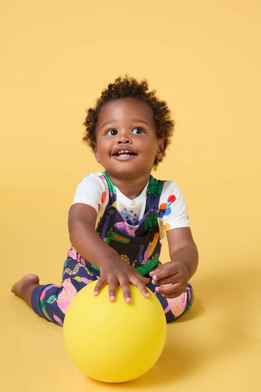 Image of a model wearing Pants. Productname: Book Club Baby Overalls in Navy colour by brand - Gorman