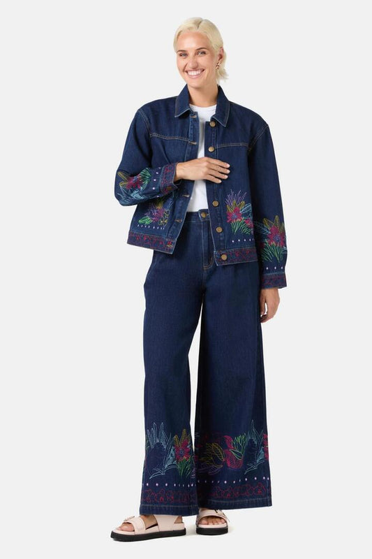 Image of a model wearing Outerwear. Productname: Monkey Forest Denim Jacket in Indigo colour by brand - Gorman