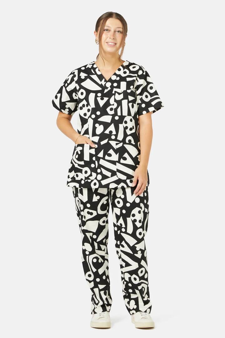 Image of a model wearing Uniforms & Workwear. Productname: Moonshine Scrub Set in Black colour by brand - Gorman