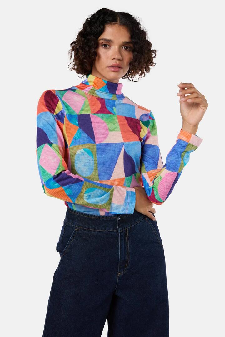 Image of a model wearing Tops. Productname: Cutting Shapes Merino Polo in Print colour by brand - Gorman