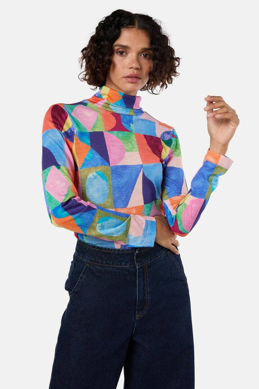 Image of a model wearing Tops. Productname: Cutting Shapes Merino Polo in Print colour by brand - Gorman