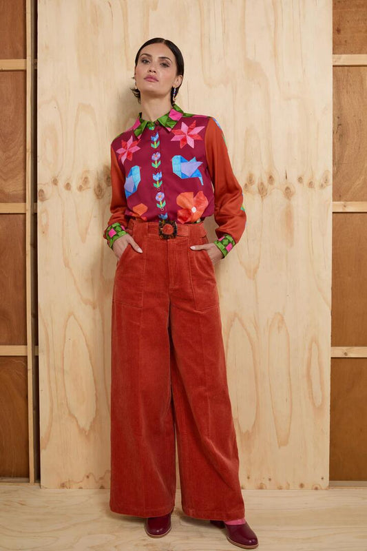 Image of a model wearing Pants. Productname: Morrie Flare Cord Pant in Blush colour by brand - Gorman