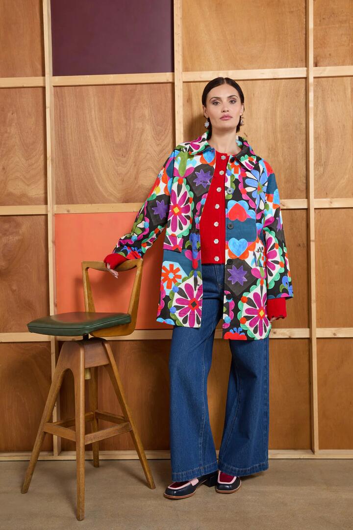 Image of a model wearing Outerwear. Productname: Friendly Folk Duster Jacket in Print colour by brand - Gorman