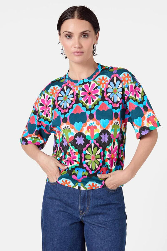 Image of a model wearing Tops. Productname: Friendly Folk Tee in Print colour by brand - Gorman