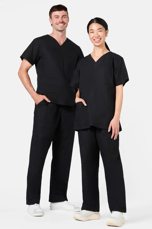 Image of a model wearing Uniforms & Workwear. Productname: Plain Black Scrub Set in Black colour by brand - Gorman
