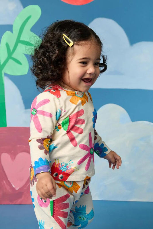 Image of a model wearing Tops. Productname: Lucky Flower Baby LS Tee in Cream colour by brand - Gorman