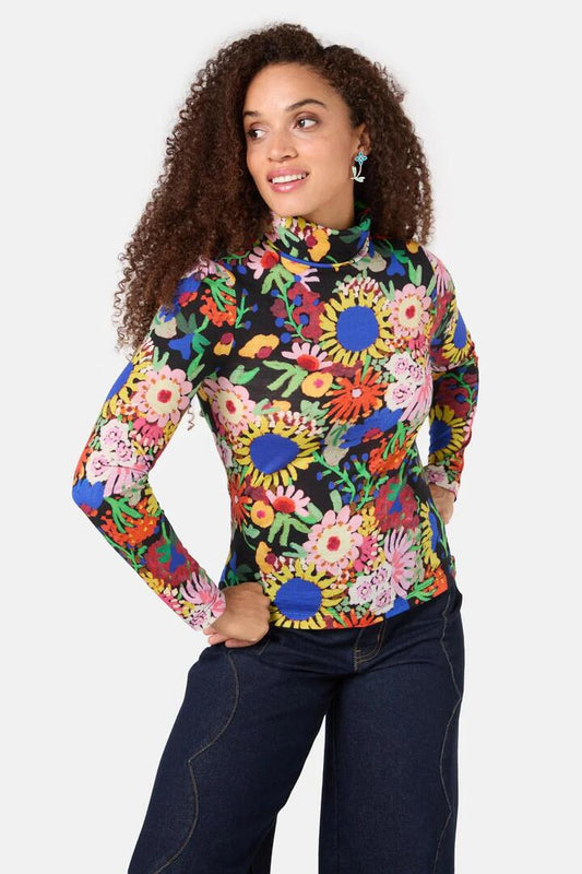 Image of a model wearing Tops. Productname: Bloomscape Polo Top in Print colour by brand - Gorman