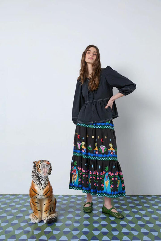 Image of a model wearing Tops. Productname: Mia Smock Top in Black colour by brand - Gorman