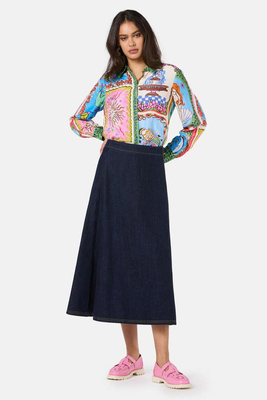 Image of a model wearing Skirts. Product name - Garden Growers Denim Wrap Skirt in Indigo colour by brand - Gorman