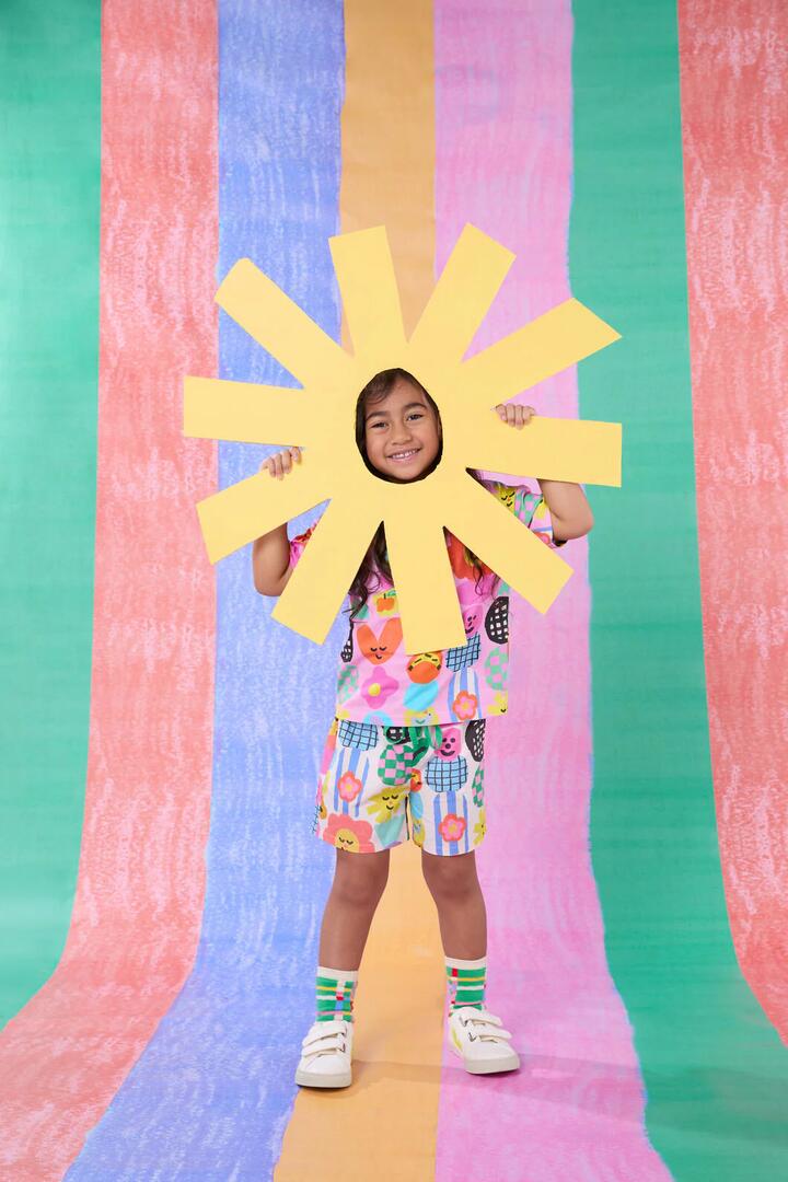 Image of a model wearing Shorts. Productname: Stack Up Kids Short in Cream colour by brand - Gorman