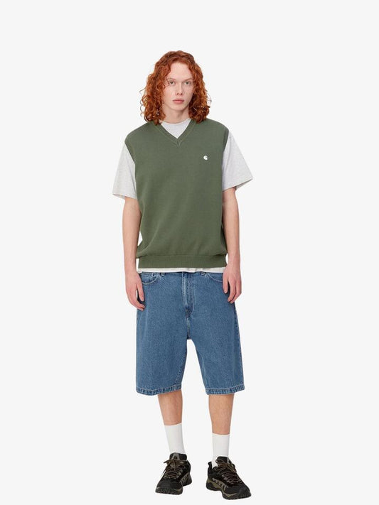 Image of a model wearing Shorts. Productname: Carhartt Wip Landon Short in Blue Heavy Stone Wash colour by brand - Carhartt Wip