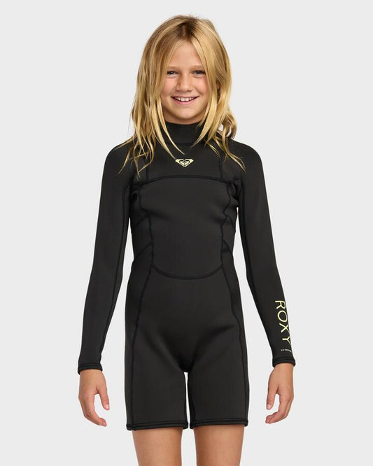 Image of a model wearing Tops. Product name - Roxy Girls 2-16 2/2Mm Prologue+ Long Sleeve Springsuit Black in Black colour by brand - Roxy