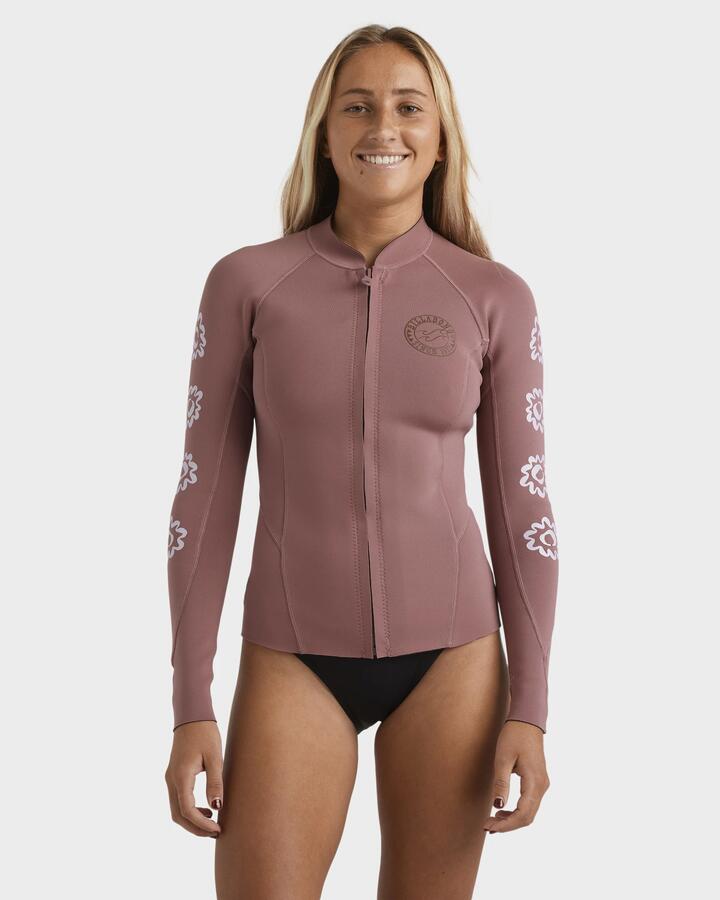 Image of a model wearing Tops. Productname: Billabong - Womens 1/1 Peeky Long Sleeve Wetsuit Top - Rosewood - in Rosewood colour by brand - Billabong