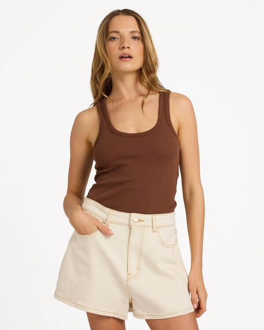 Image of a model wearing Tops. Product name - Roxy Womens Base Rib Tank Top Coffee in Coffee colour by brand - Roxy