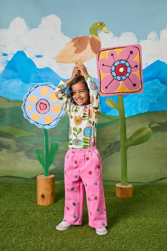 Image of a model wearing Tops. Productname: Wallpaper Kids LS Tee in Cream colour by brand - Princess Highway Kids