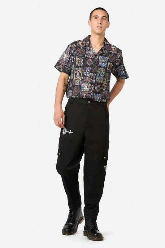Image of a model wearing Pants. Productname: Reclaim Patch Cargos in Black colour by brand - Black Friday