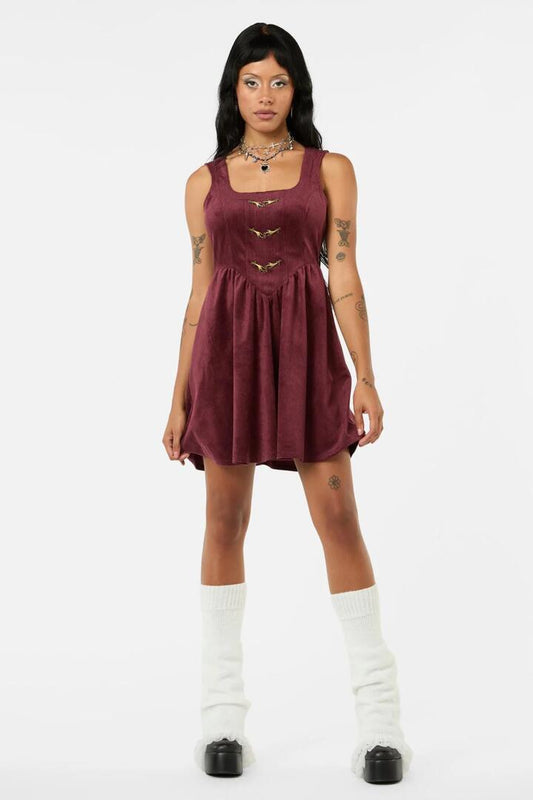 Image of a model wearing Dress. Productname: Unified Cord Pinny in Maroon colour by brand - Black Friday
