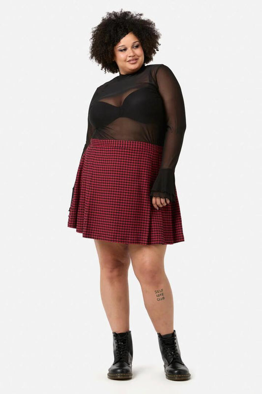 Image of a model wearing Skirts. Productname: Curve Virtue Houndstooth Skirt in Red/Black colour by brand - Black Friday