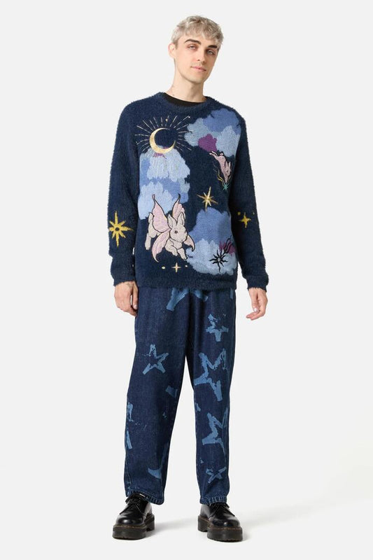 Image of a model wearing Tops. Productname: Moon Time Unisex Knit in Navy colour by brand - Dangerfield