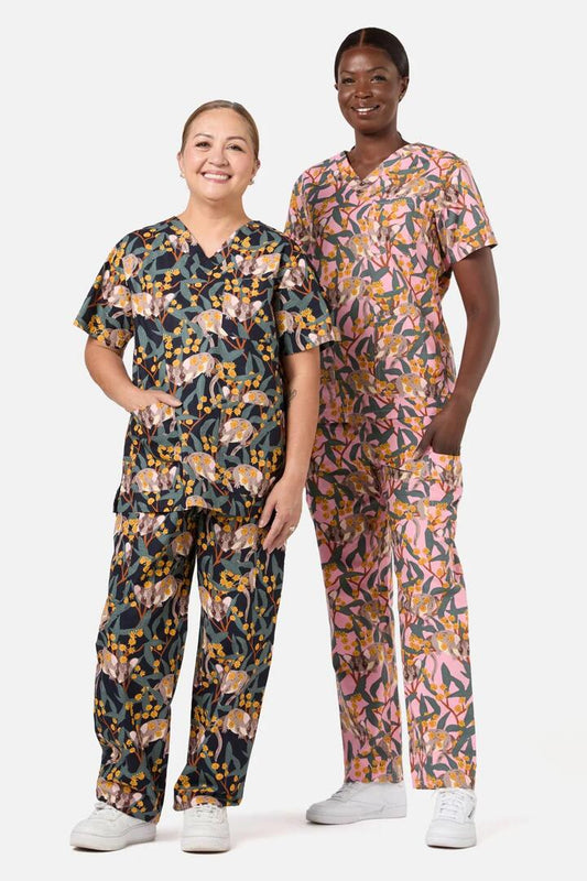 Image of a model wearing Uniforms & Workwear. Productname: Navy Fairy Possum Scrub Set in Navy colour by brand - Scrubs With Love
