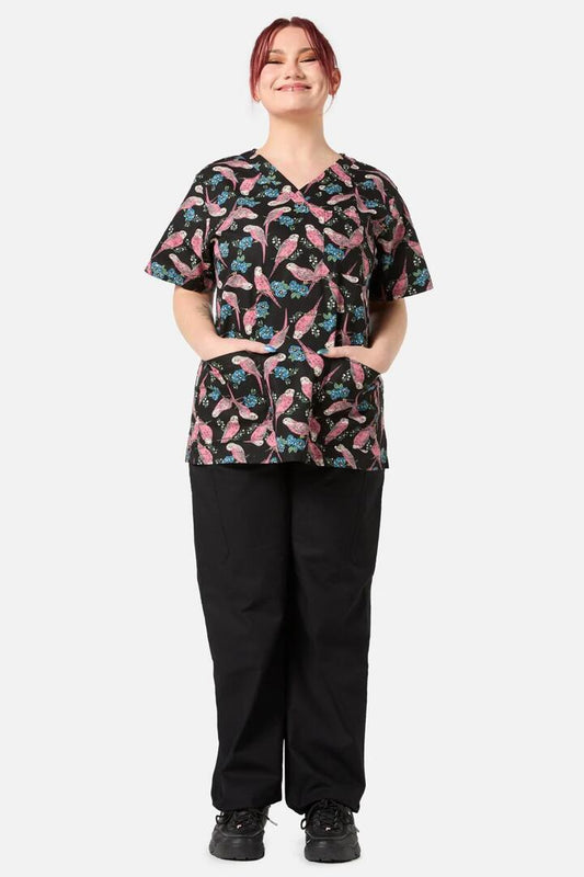 Image of a model wearing Pants. Productname: Budgie Love Top & Pant Scrub Set in Black colour by brand - Scrubs With Love