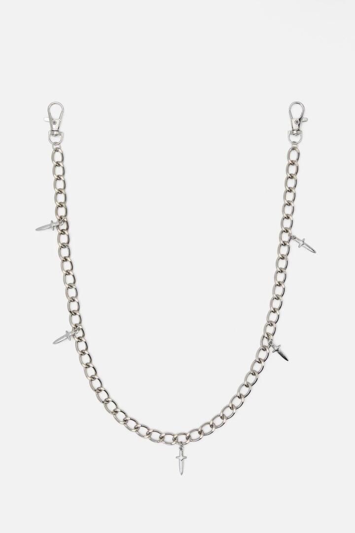 Image of a model wearing Pants. Productname: Dagger Pants Chain in Silver colour by brand - Black Friday