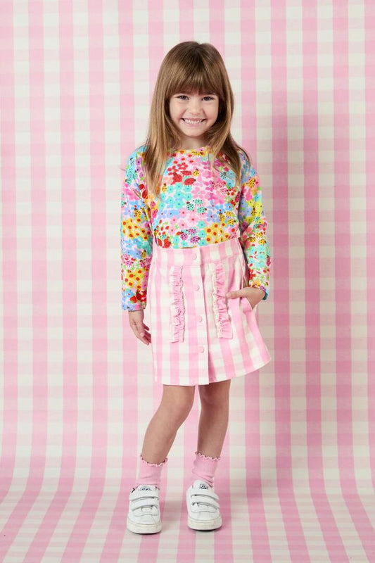Image of a model wearing Skirts. Productname: Gingham Kids Frill Skirt in Pink colour by brand - Princess Highway Kids
