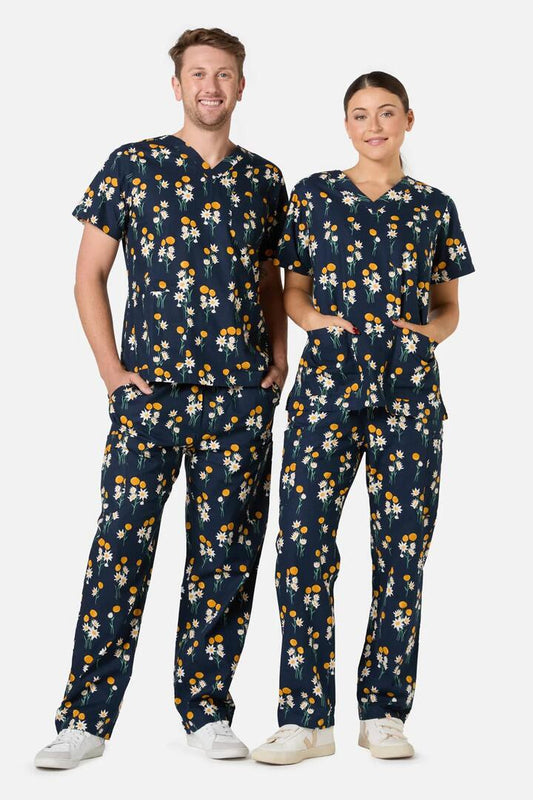 Image of a model wearing Uniforms & Workwear. Productname: Billy Button Scrub Set in Navy colour by brand - Scrubs With Love