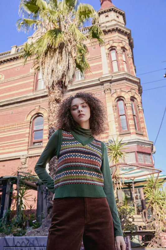 Image of a model wearing Tops. Productname: Fairisle Knit Vest in Olive colour by brand - Princess Highway