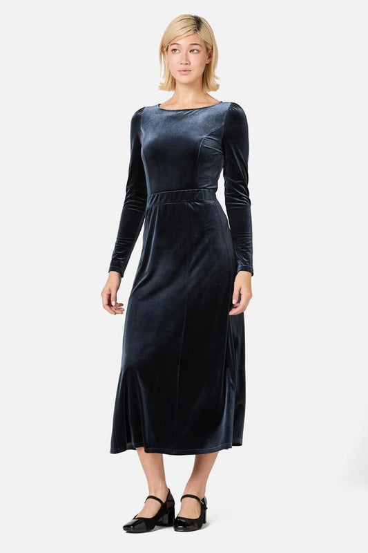 Image of a model wearing Skirts. Productname: Monica Velvet Midi Skirt in Midnight colour by brand - Princess Highway