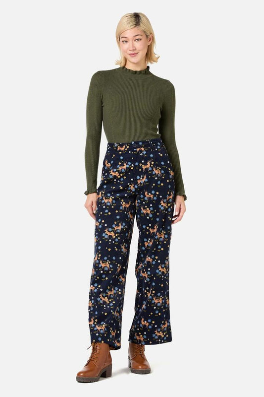 Image of a model wearing Pants. Productname: Meadow Deer Cord Pant in Navy colour by brand - Princess Highway