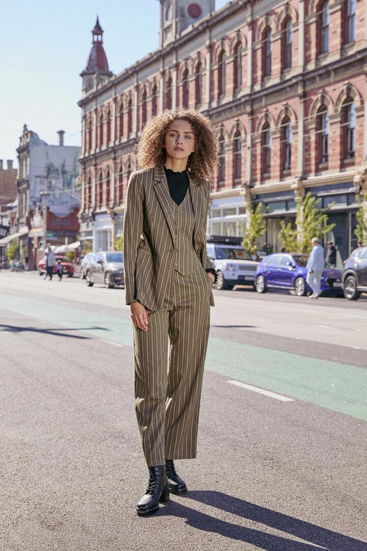 Image of a model wearing Outerwear. Productname: Abby Pinstripe Jacket in Olive colour by brand - Princess Highway