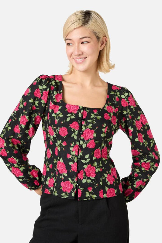 Image of a model wearing Tops. Productname: Winter Rose Blouse Top in Pink colour by brand - Princess Highway